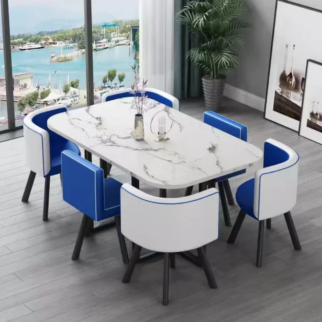 Nueva mesa de comedor clásica moderna con encimera de mármol blanco para sala de estar con juego de 6 sillas