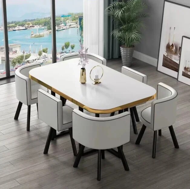 Nueva mesa de comedor clásica moderna con encimera de mármol blanco para sala de estar con juego de 6 sillas