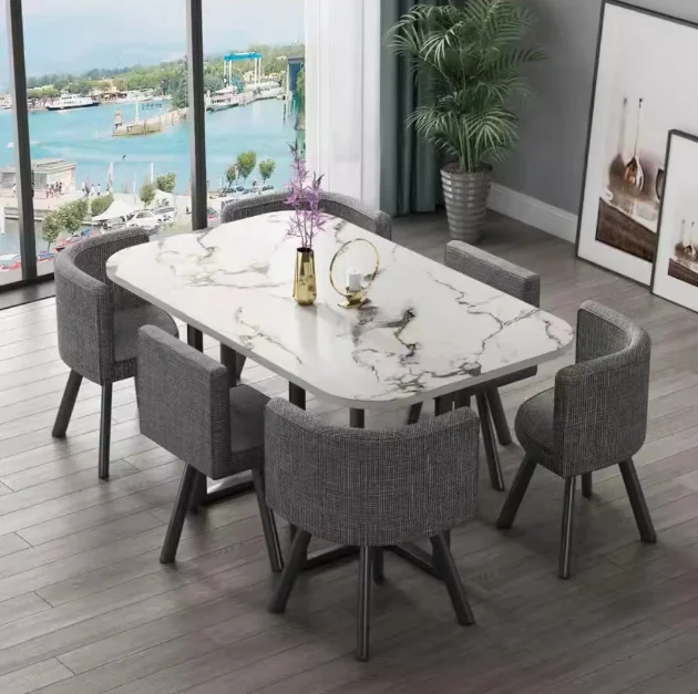Nueva mesa de comedor clásica moderna con encimera de mármol blanco para sala de estar con juego de 6 sillas