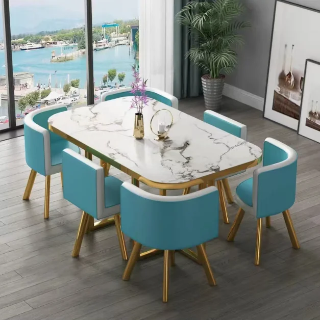Nueva mesa de comedor clásica moderna con encimera de mármol blanco para sala de estar con juego de 6 sillas