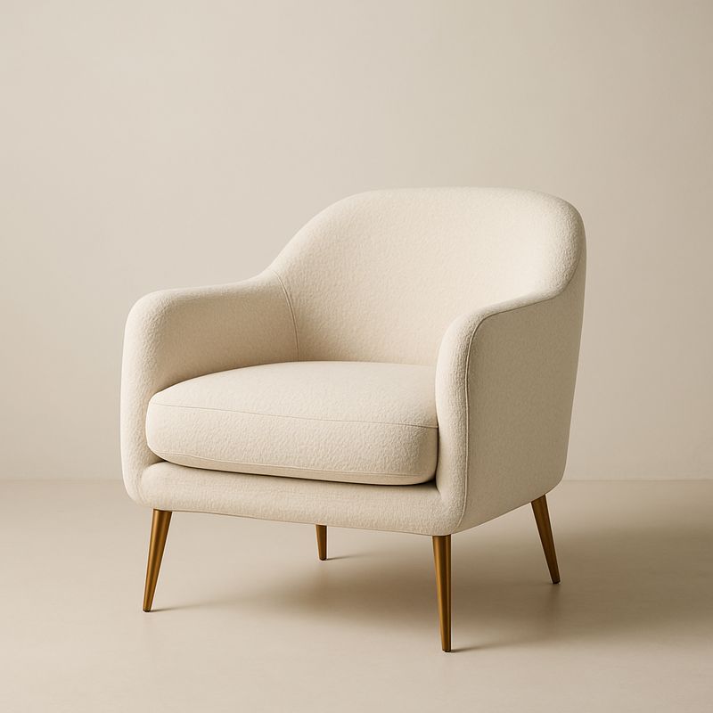 Fotel tapicerowany kremowy z metalowymi nogami