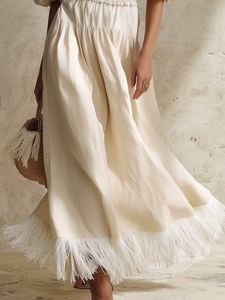 Resort-style Off-shoulder Puff-sleeved Tassel Maxi Dress