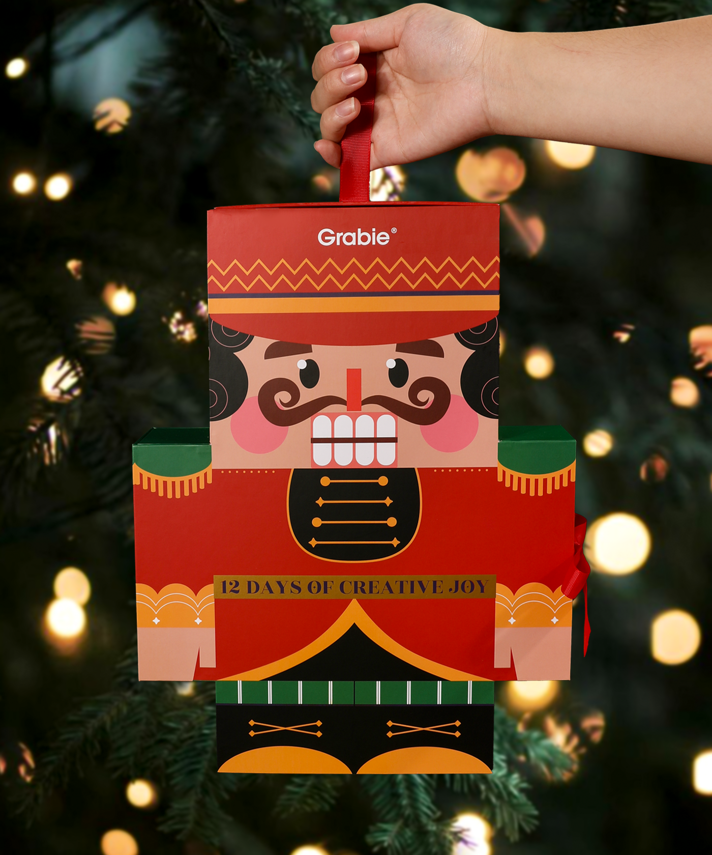 3D Nutcracker Creative Advent Calendar displayed beside a Christmas tree