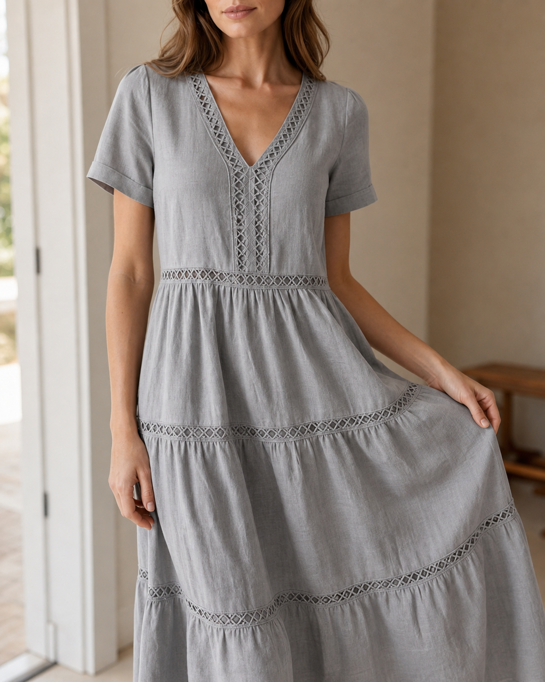 Fabric detail styling reference in Grey V-neck lace trim tiered dress