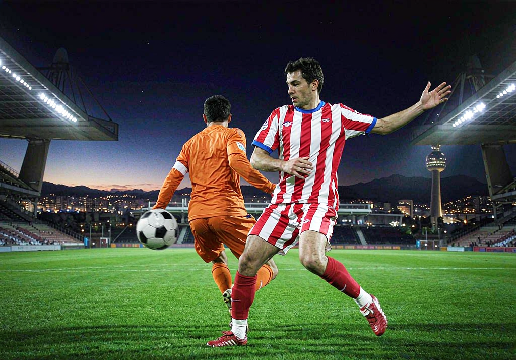 AS Monaco player celebrating a goal at the Stade Louis II