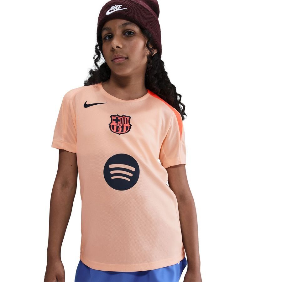 Barcelona Training T-Shirt Dri-FIT Strike 3rd - Crimson Tint/Bright Mango/Midnight Navy Kids-SoccerKits Hub | Buy Soccer Jerseys Online