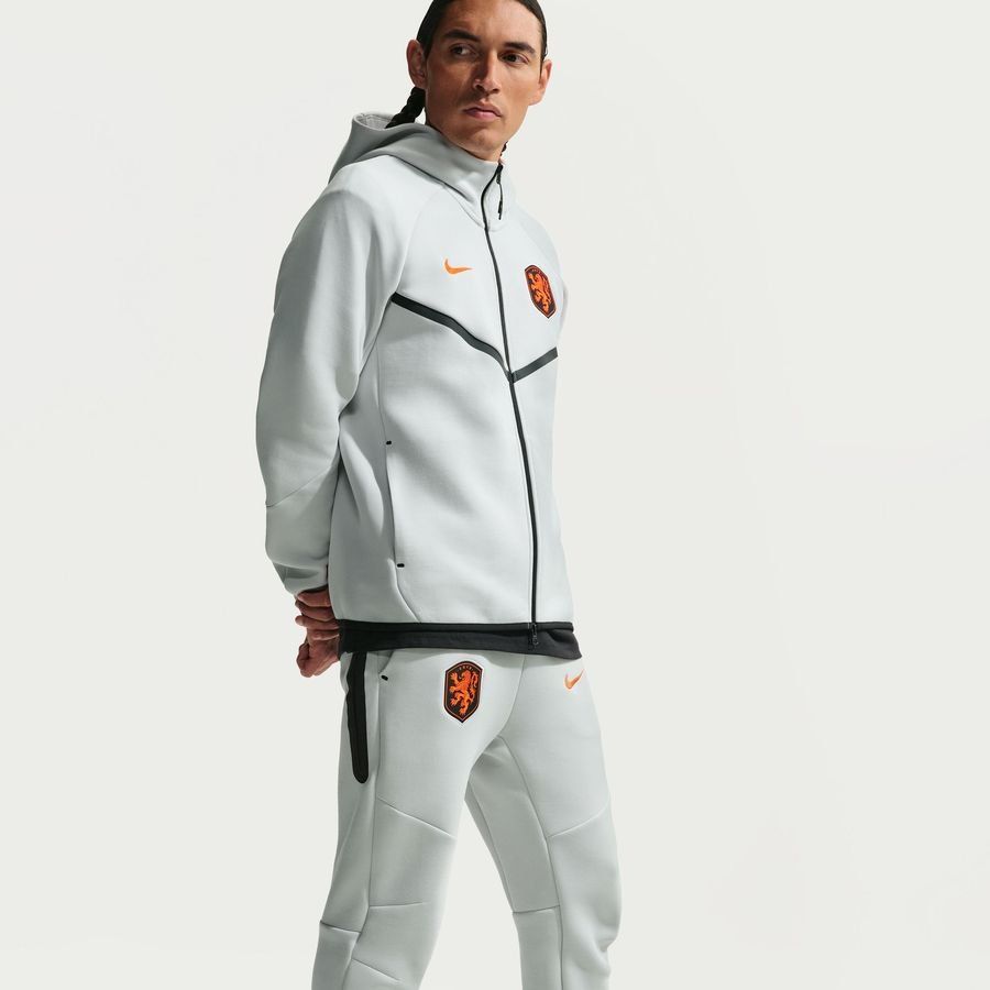 Holland Sweatpants NSW Tech Fleece World Cup 2026 - Photon Dust/Hyper Crimson/Black - Men's-SoccerKits Hub | Buy Soccer Jerseys Online
