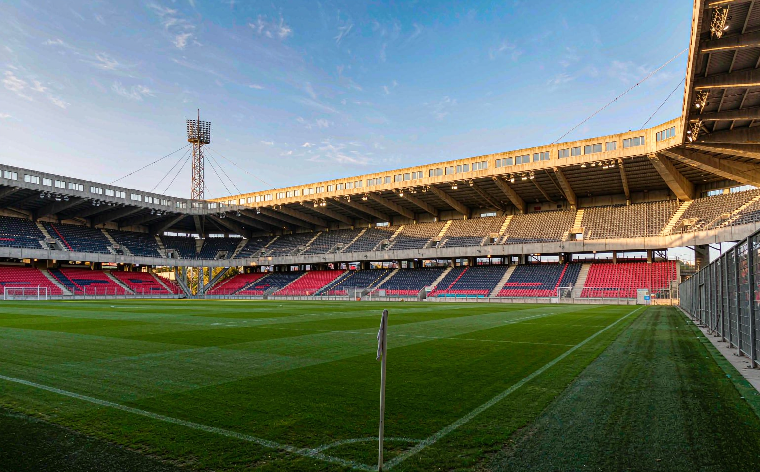 The pitch at Parc des Princes under bright afternoon sun