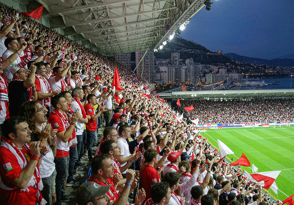 AS Monaco fans at Stade Louis II with red and white flags