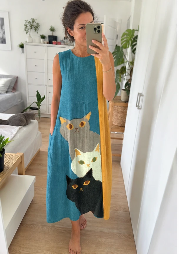 Türkis-gelbes Katzenkleid beim Spiegel-Selfie