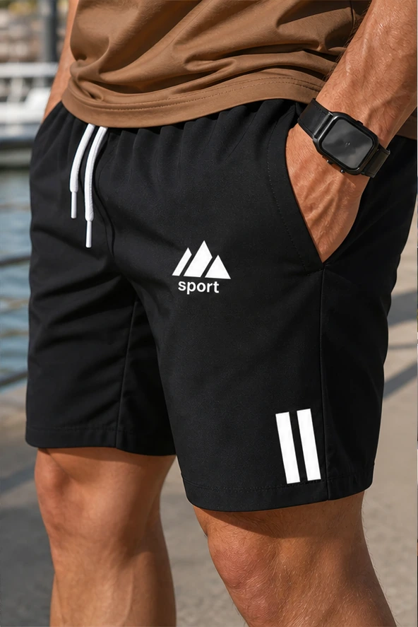 Detail von Bund, Kordelzug, Tasche, Motiv und Shorts-Saum
