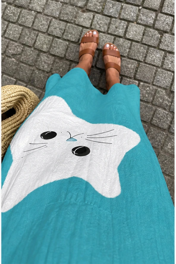 Türkises Katzenkleid aus der Ich-Perspektive