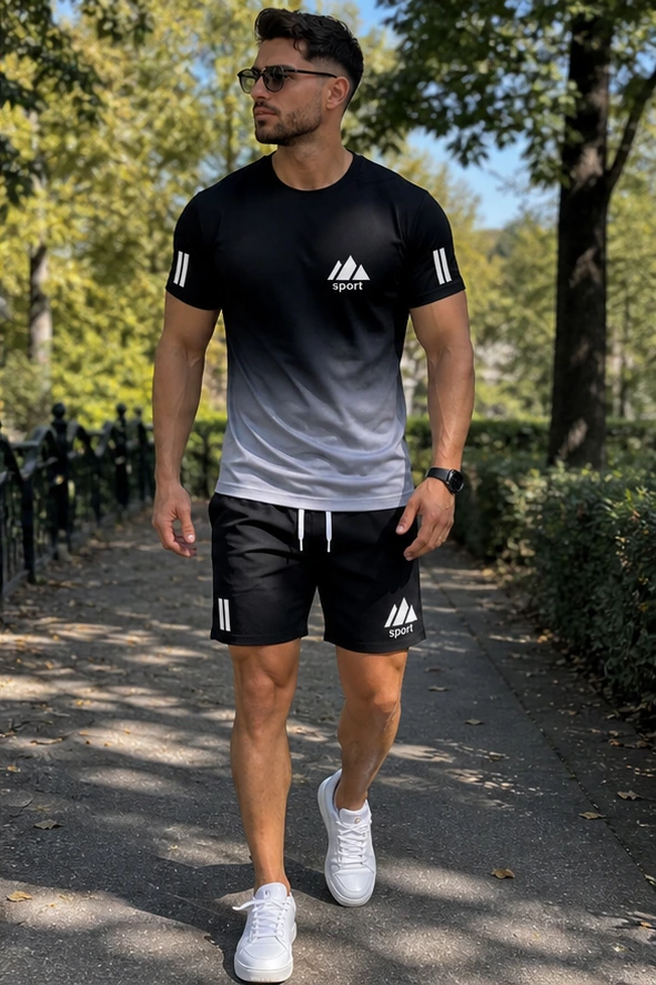 Grau verlaufendes Herren Sport-Set beim Parkspaziergang