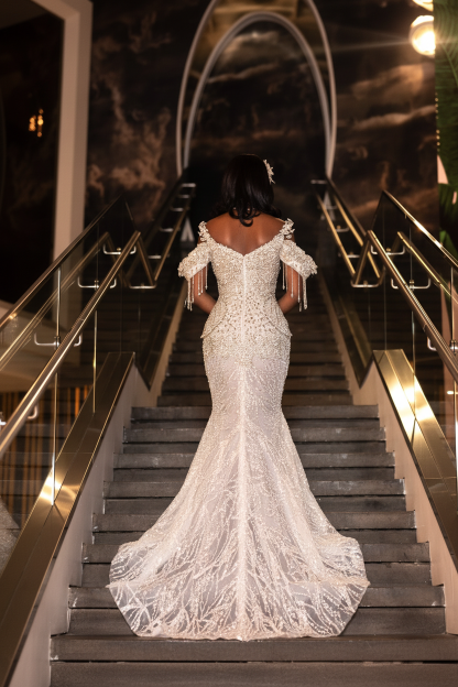 Ivory crystal beaded mermaid prom dress back view