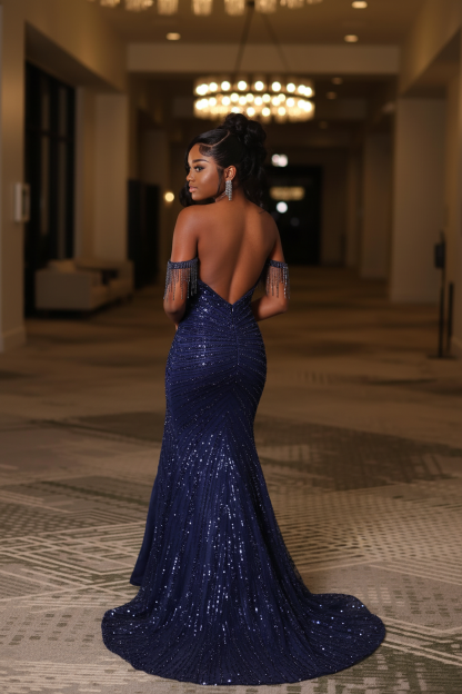Navy blue sequin mermaid prom dress - back view showing open back and sweep train