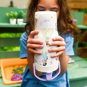 Girl holding Disney Princess stainless steel water tumbler upside-down with open spout and no leaks.
