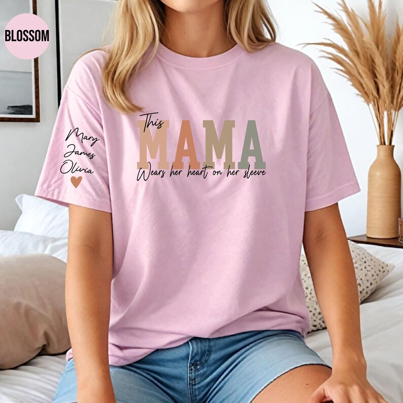 Custom This Mama Wears Her Heart On Her Sleeve Shirt, Personalized Mom Shirt With Kids Names, Mom Tshirt, Mothers Day Gift