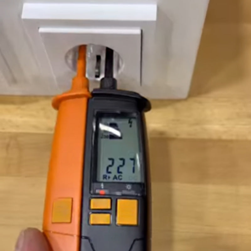 Microprocessor-controlled digital voltage tester