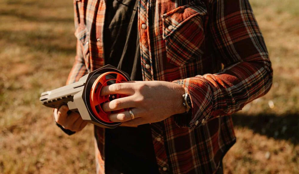 Handheld UFO thrower