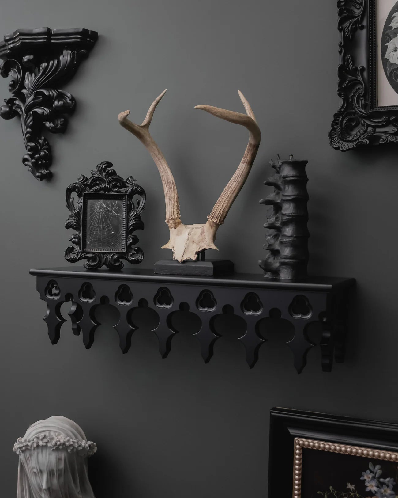 The Gothic Revival fireplace mantel is made of hardwood (beech)