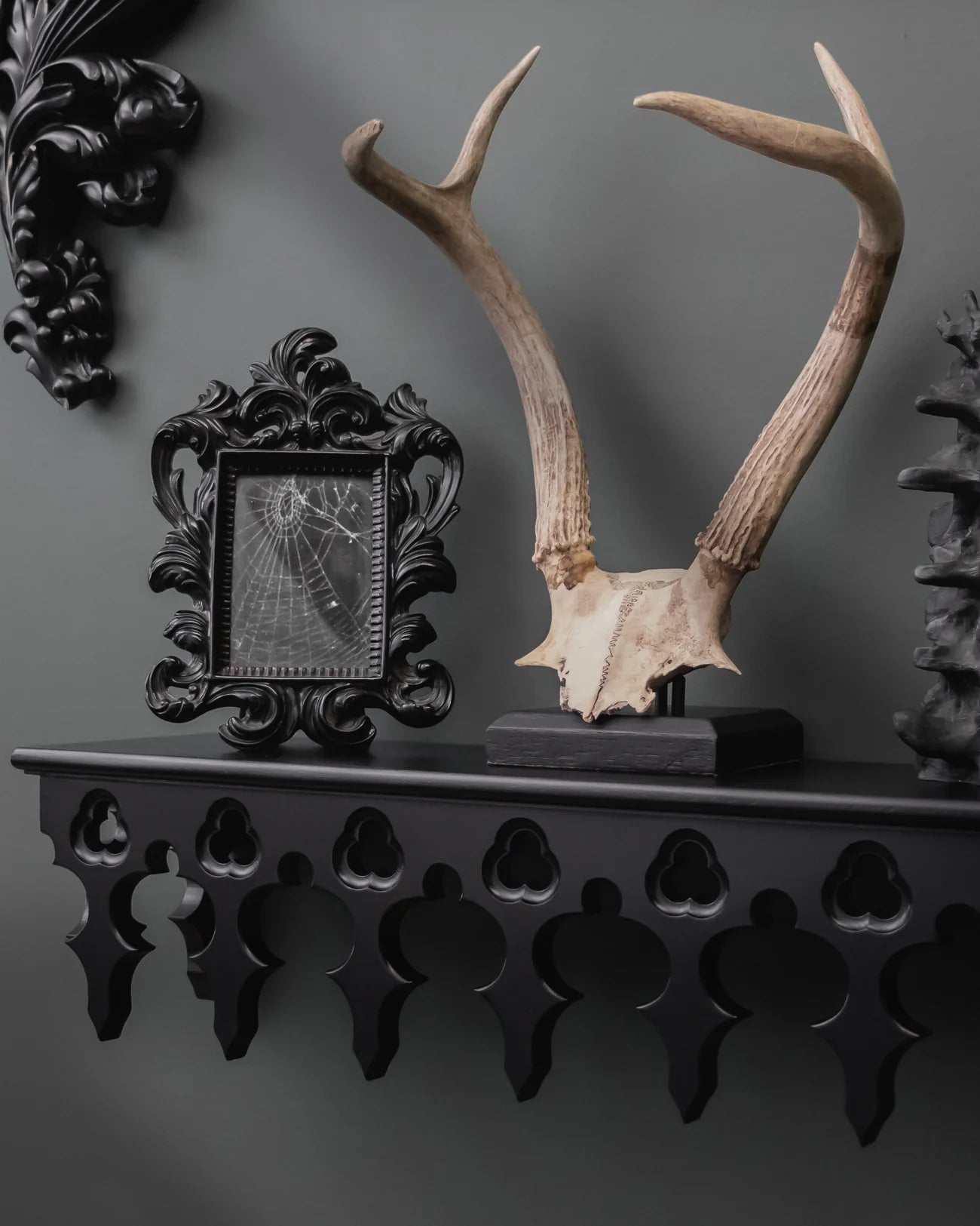 The Gothic Revival fireplace mantel is made of hardwood (beech)