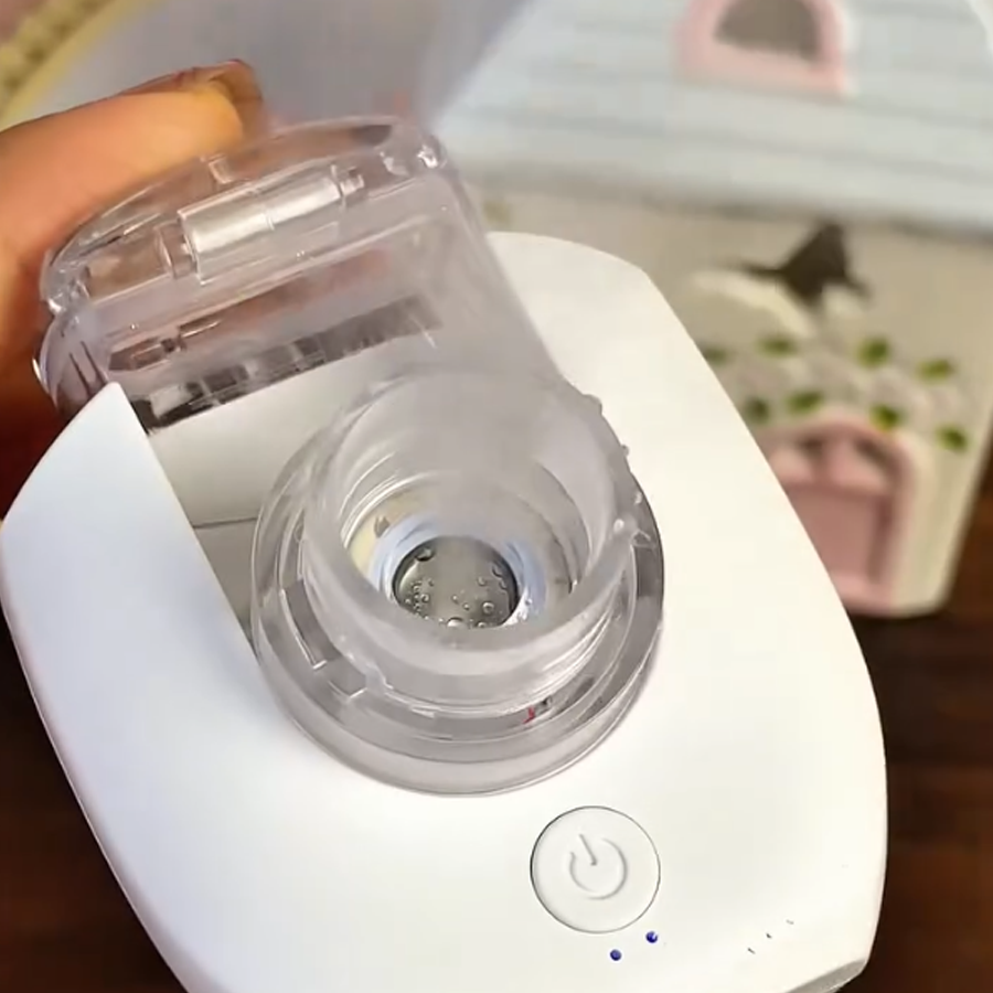 Portable and compact breathing nebulizer