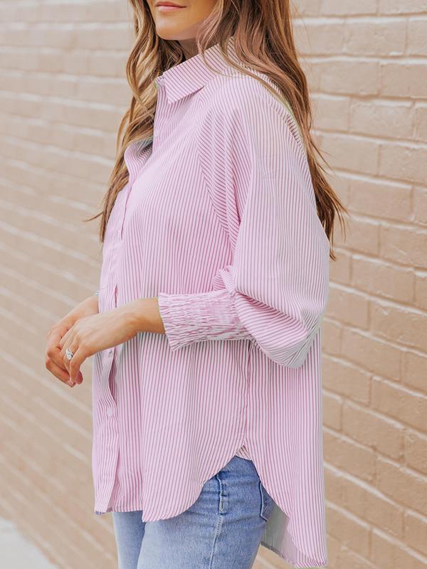 Mid-length shirt with striped lapel and oversized drawdown sleeves