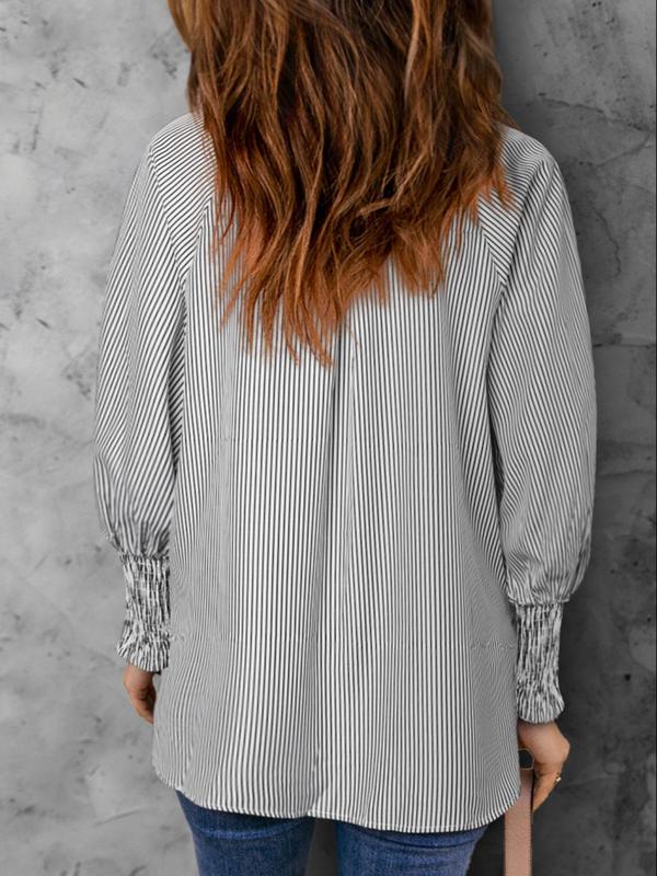 Mid-length shirt with striped lapel and oversized drawdown sleeves