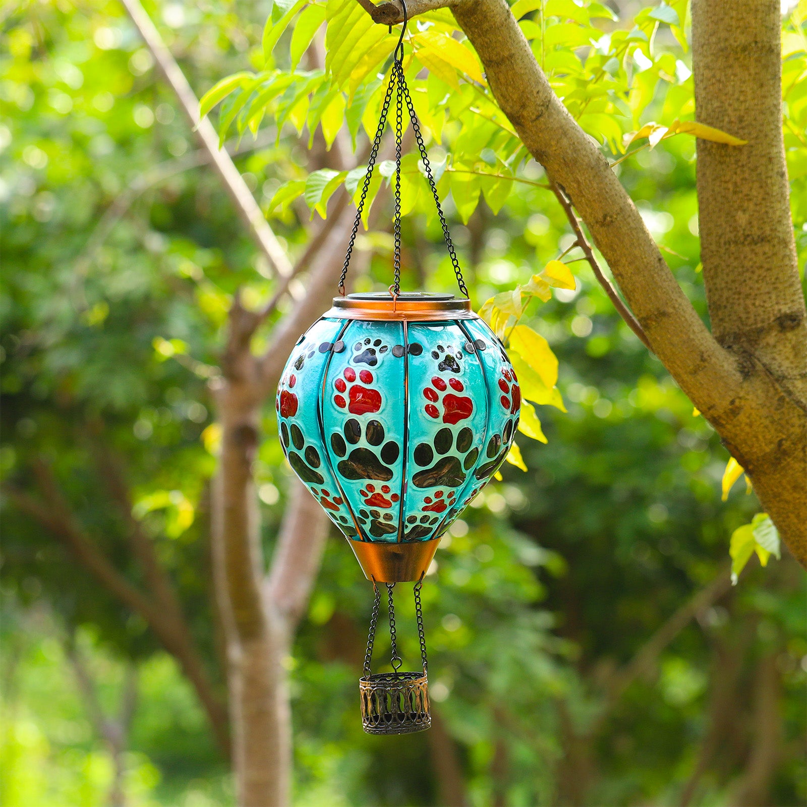 Balloon-shaped solar lantern designed for pet lovers, featuring paw prints and ideal for backyard solar garden lighting