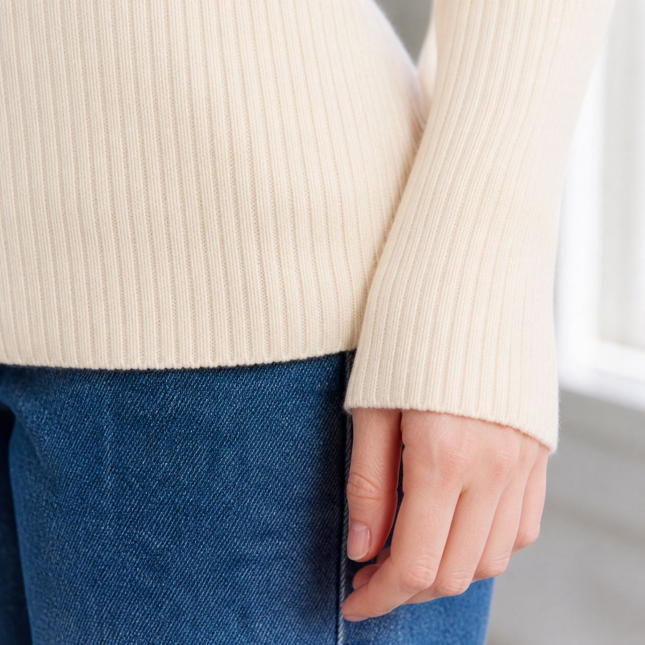 Close-up of sweater sleeve cuff and hem