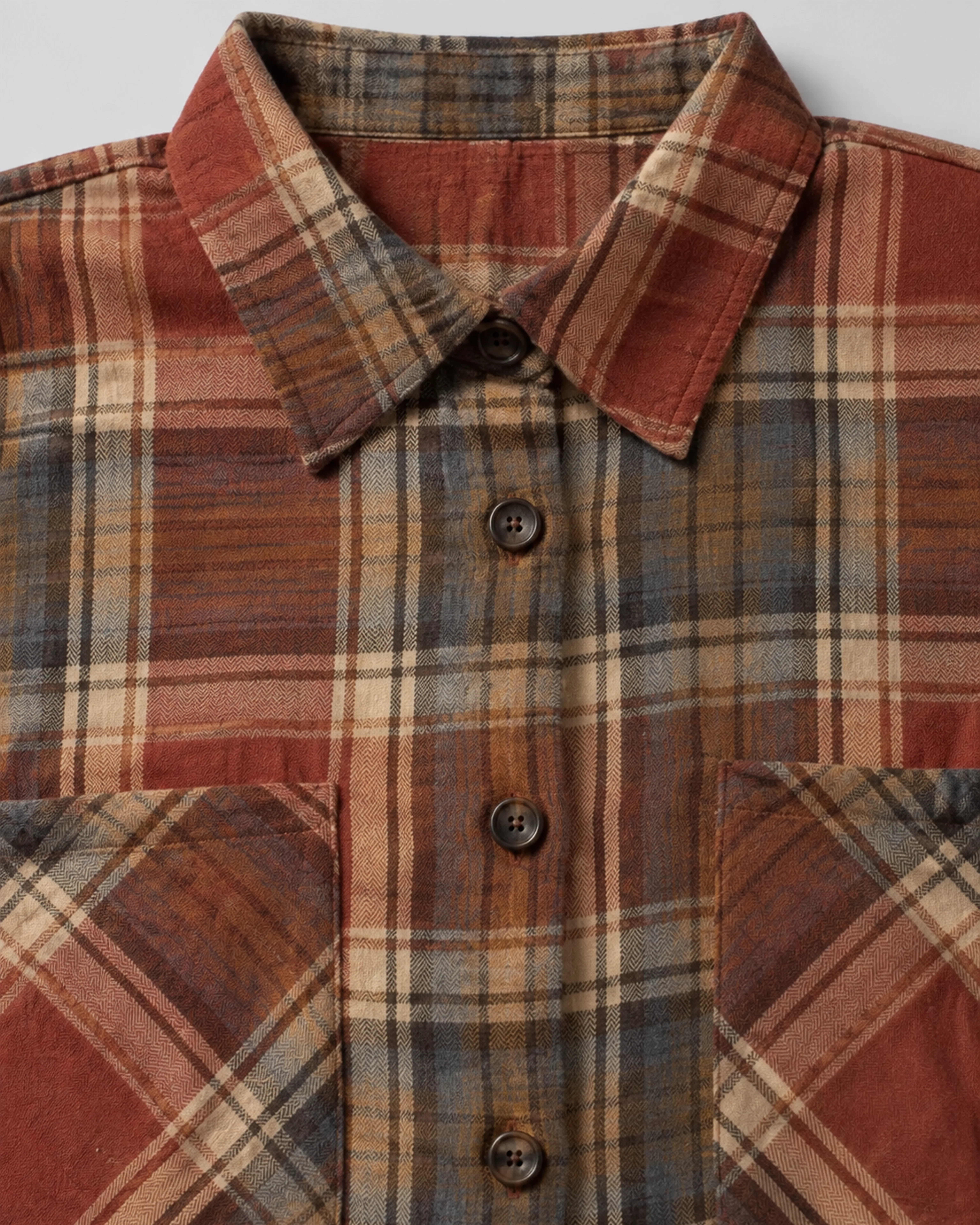 Collar buttons and chest pocket detail