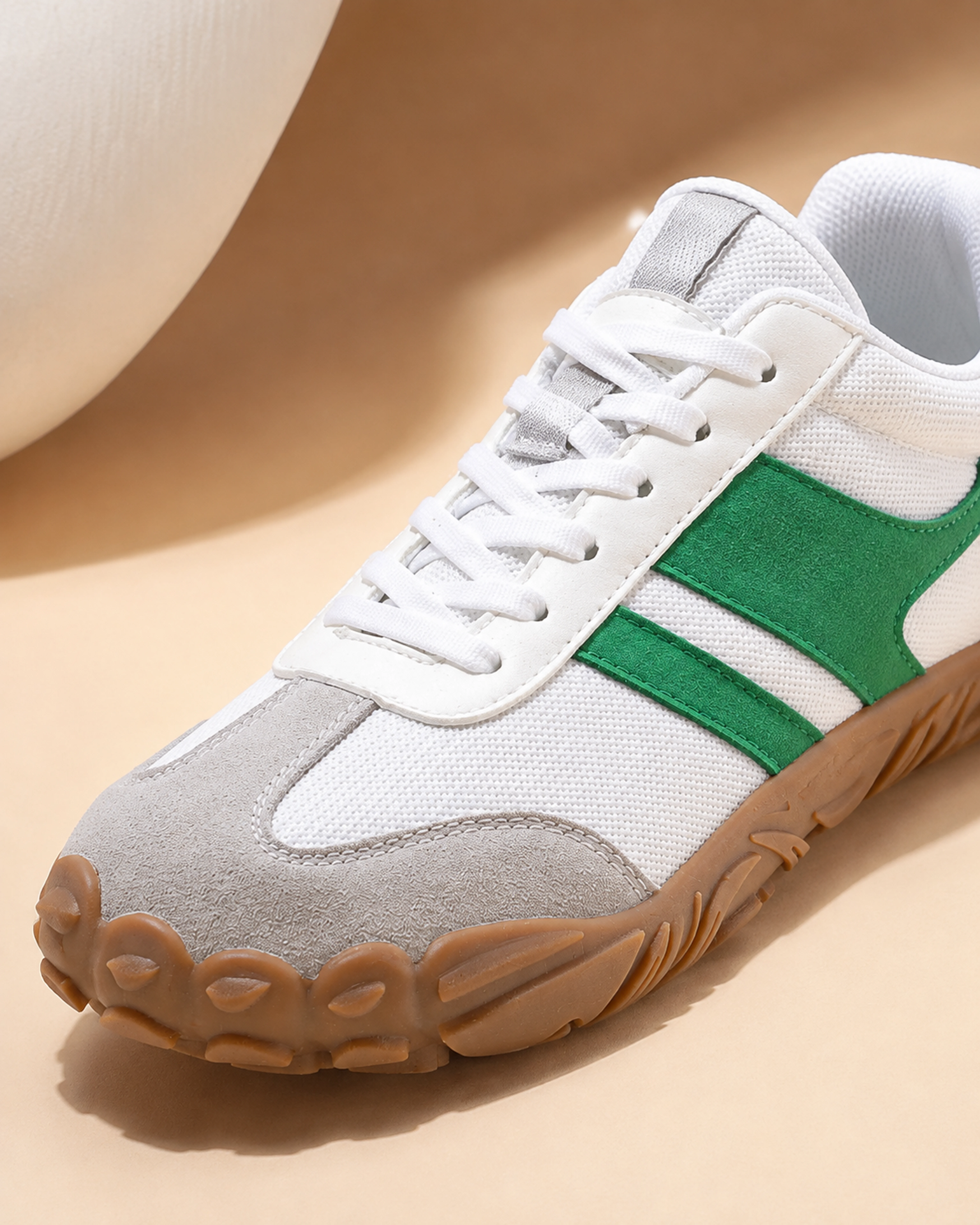 Material, cushioning, outsole and flexibility features
