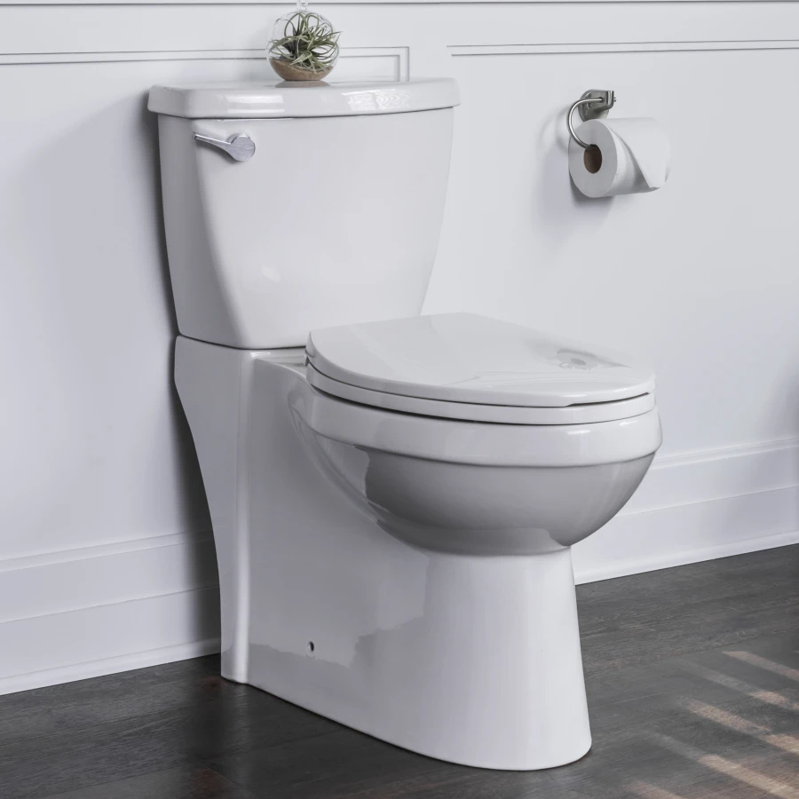 Miseno Bella Two-Piece High Efficiency Toilet with Elongated Chair Height Skirted Bowl - Includes Soft Close Seat and Wax Ring Kit