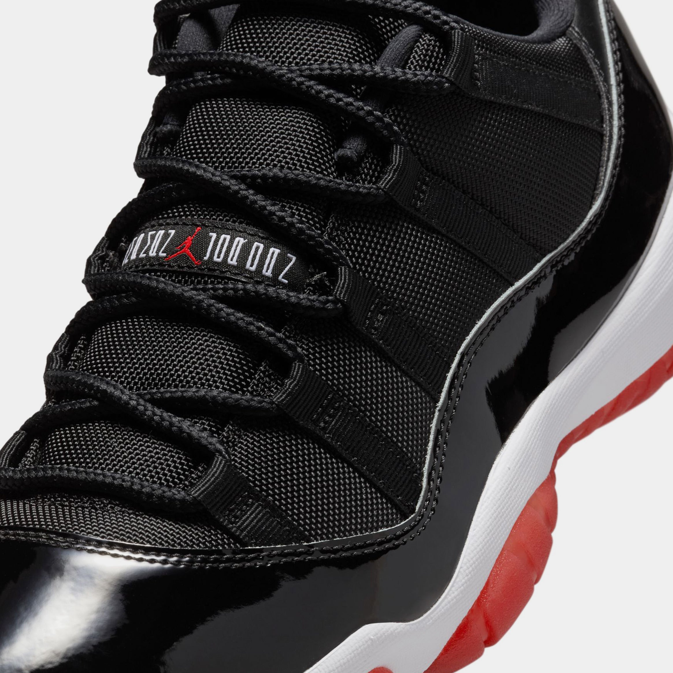 Air Jordan 11 Retro Low Bred Mens Lifestyle Shoes (Black/Varsity Red/White)