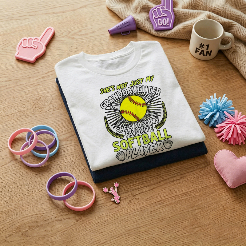 WOMEN'S She's Not Just My Grand Daughter She's Also My Softball Player Grandma 100% Cotton T-Shirt