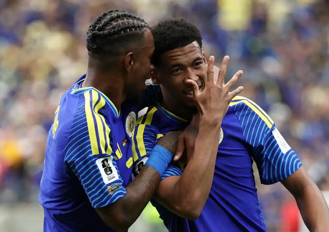 Cura&ccedil;ao players celebrating a goal