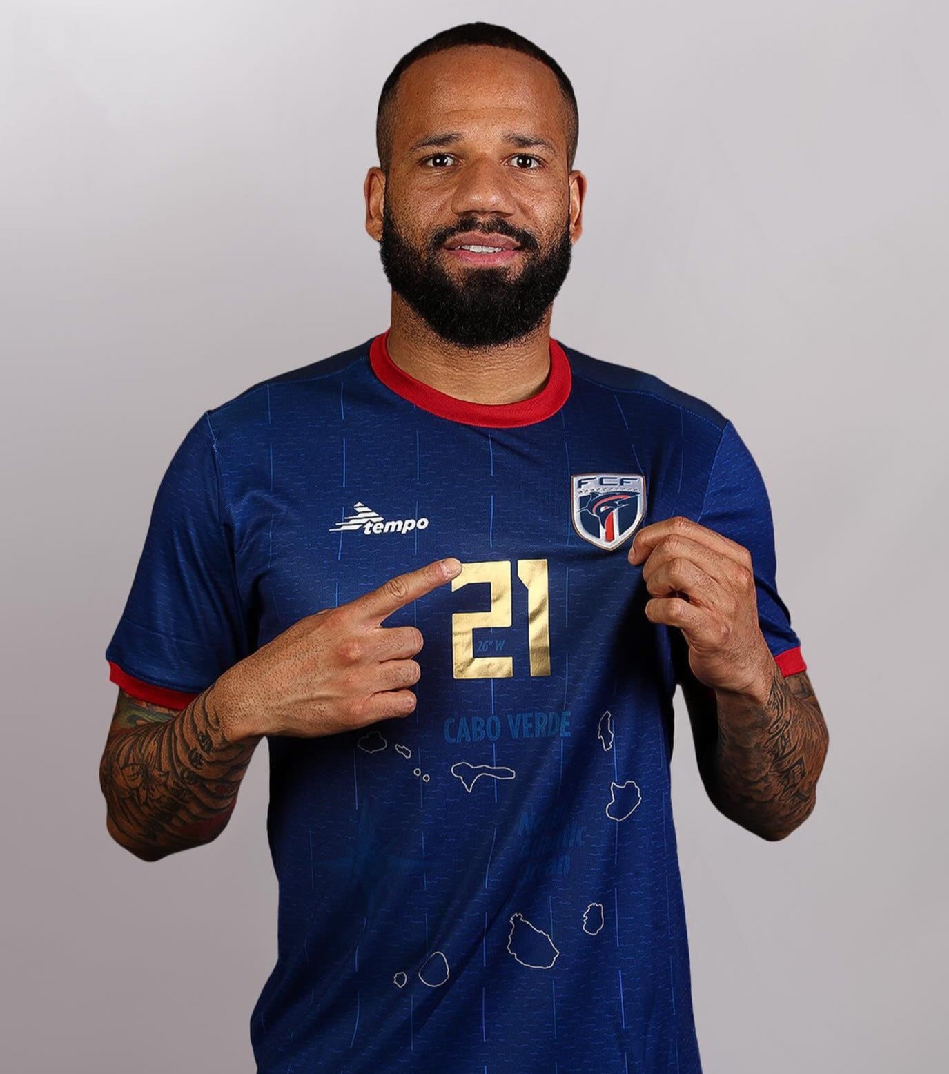 Cape Verde national team player wearing blue home jersey #21