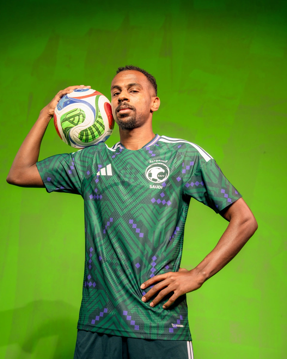 Saudi Arabia national team player wearing green home jersey