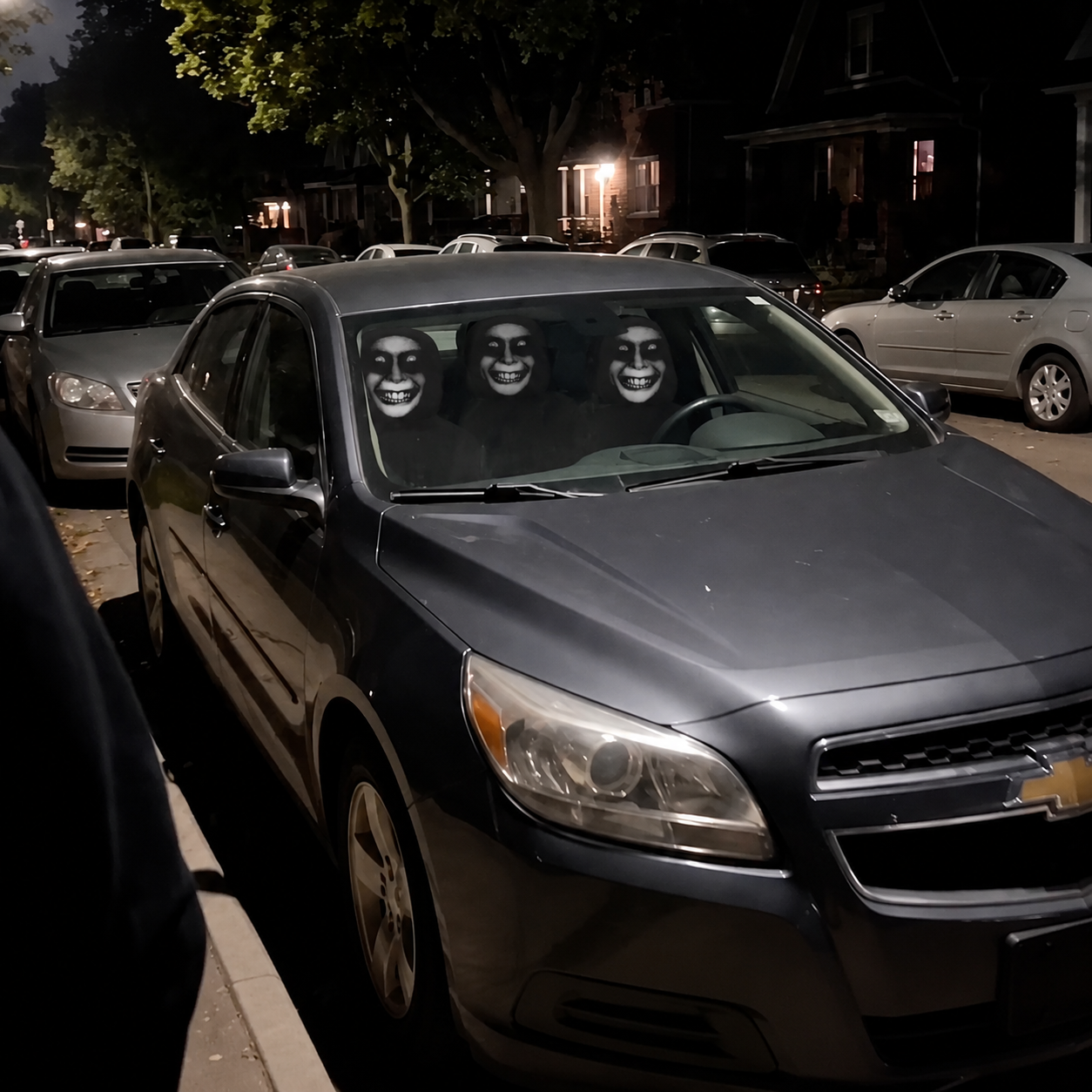Haunted phantom car headrest covers in a Halloween vehicle setup