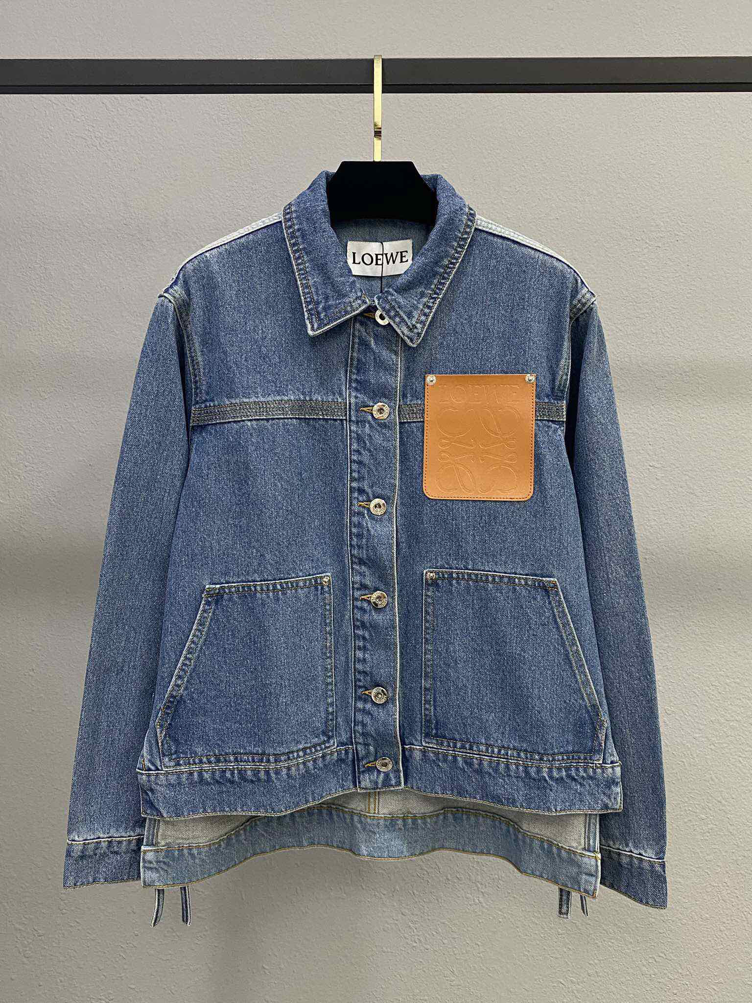 LOE25SS leather embossed logo denim jacket