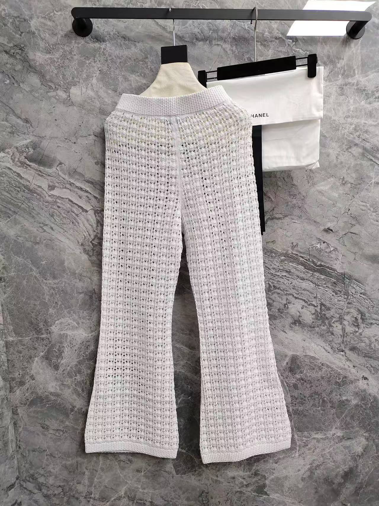 CC 26SS  Vacation style white hollow knitted pants