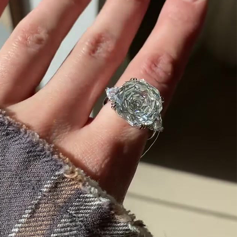 5ct Octagonal Cut White Sapphire Three-Stone Engagement Ring