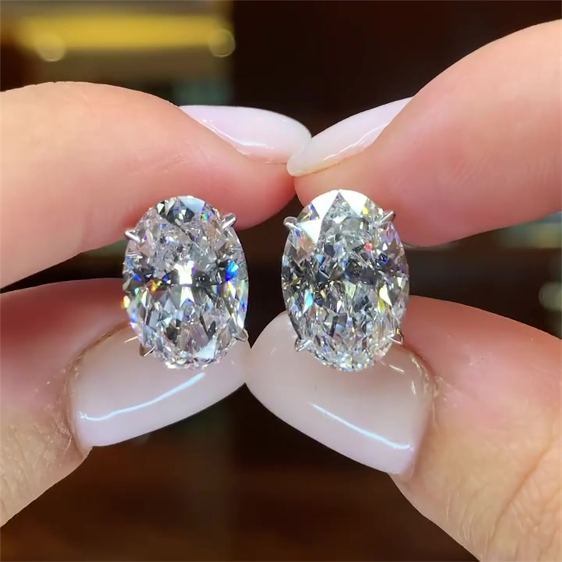 Oval Cut White Sapphire Stud Earrings