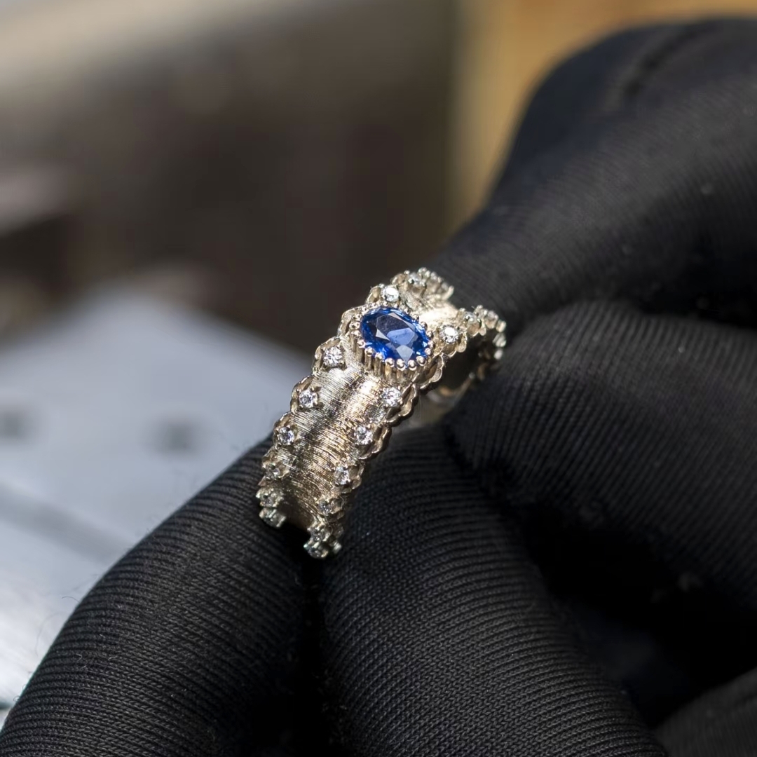 Blue Sapphire Oval Cut Brushed Platinum Band