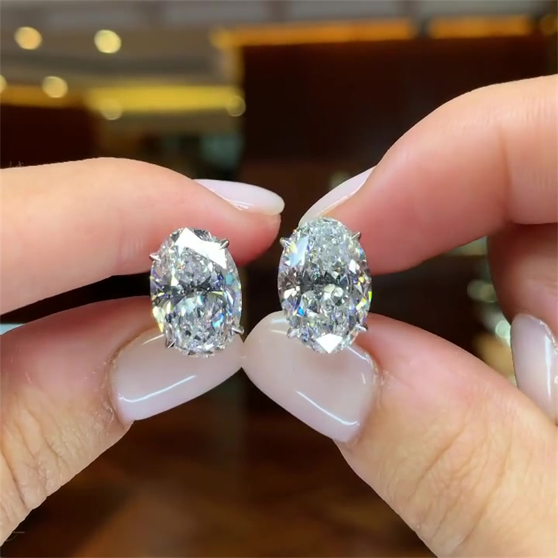 Oval Cut White Sapphire Stud Earrings