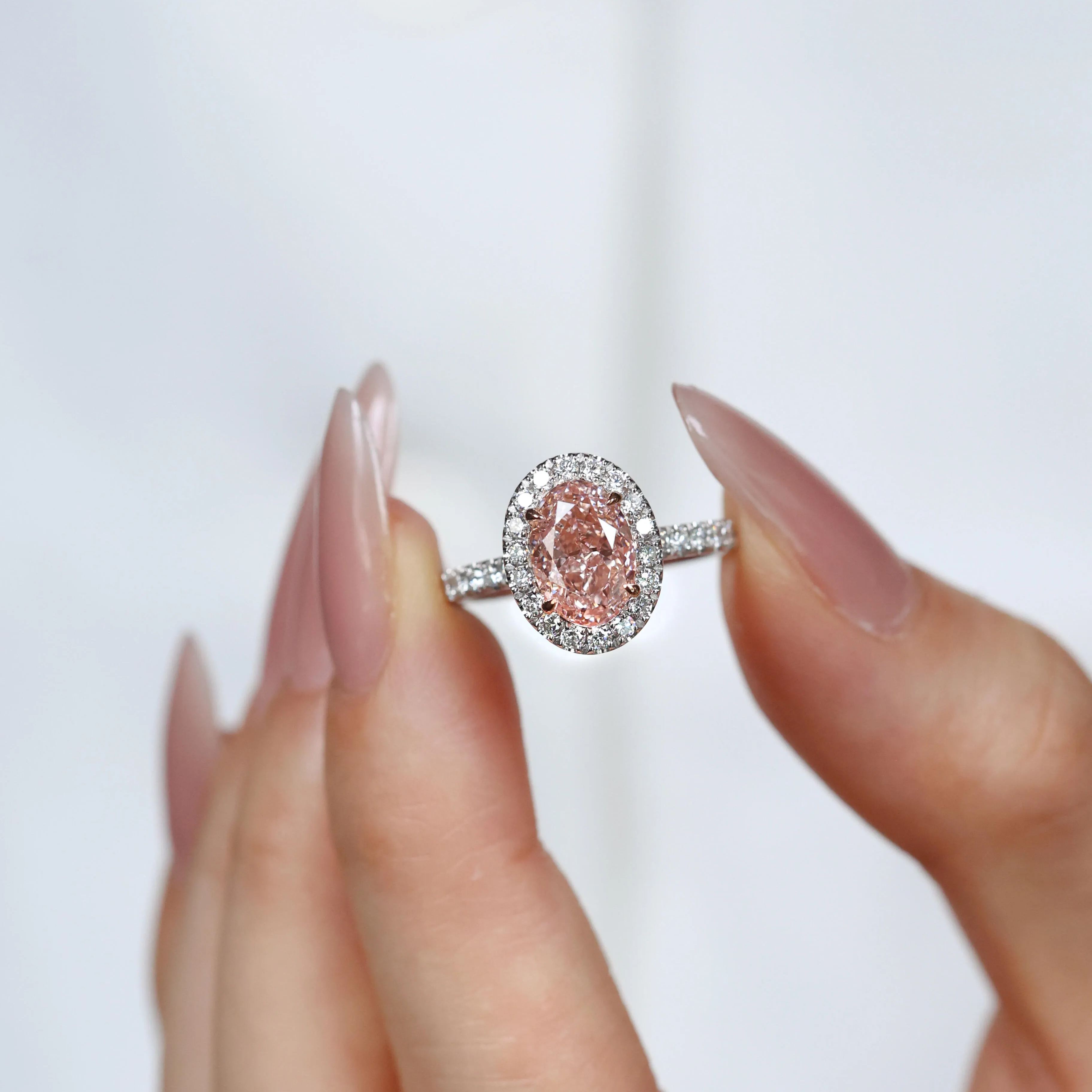 Fancy Light Pink Diamond Oval Double Halo Ring
