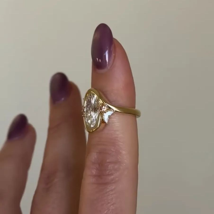 Asymmetric Moon: Oval Cut Engagement Ring