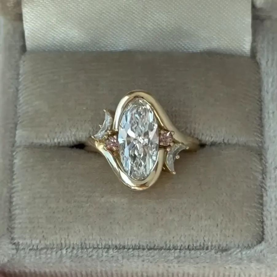 Asymmetric Moon: Oval Cut Engagement Ring