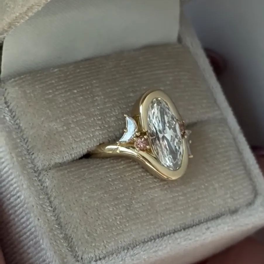 Asymmetric Moon: Oval Cut Engagement Ring