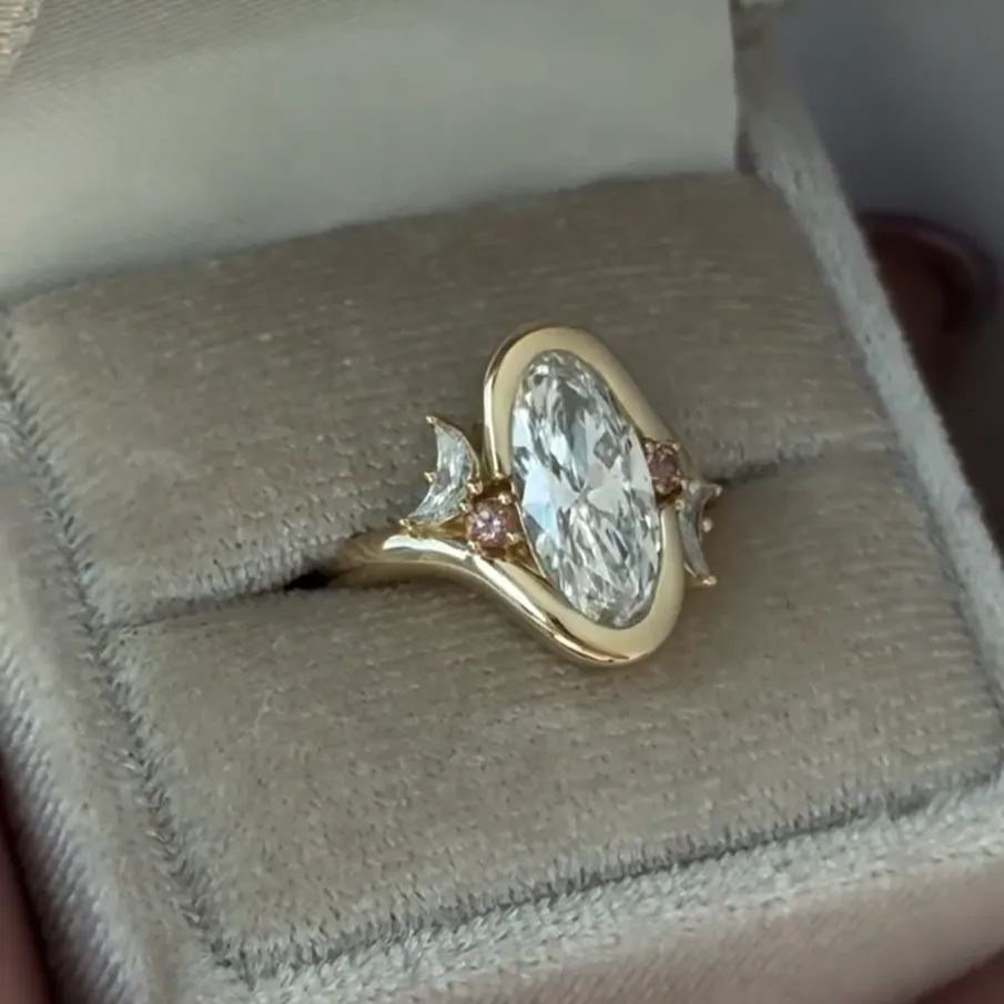 Asymmetric Moon: Oval Cut Engagement Ring
